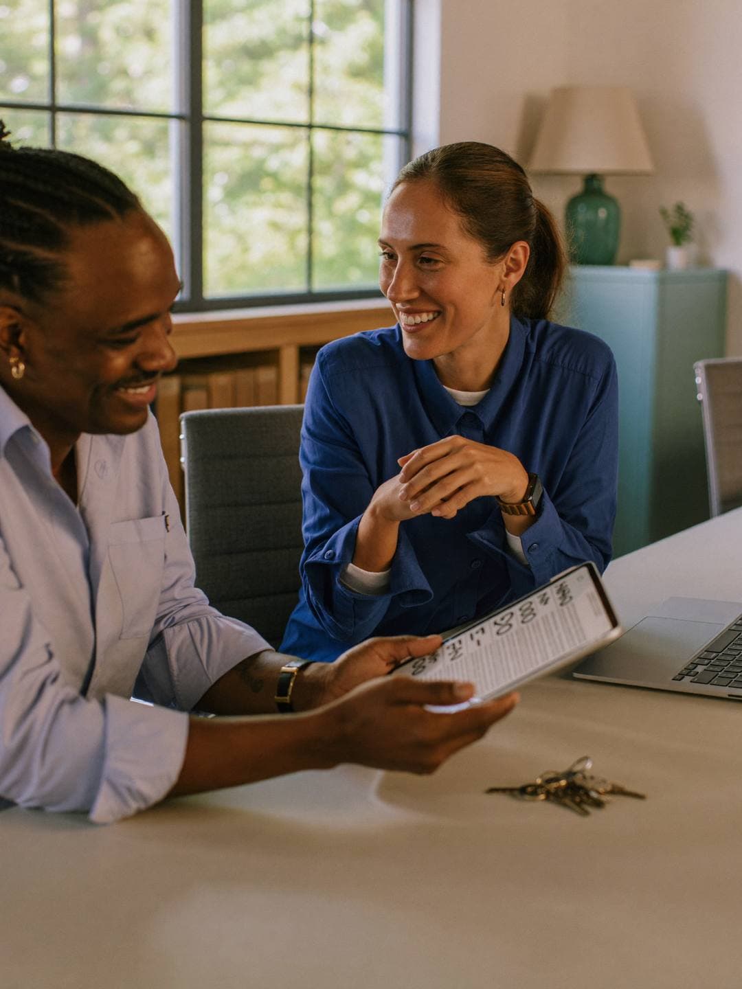 Accountant for real estate agents reviewing a sold listing